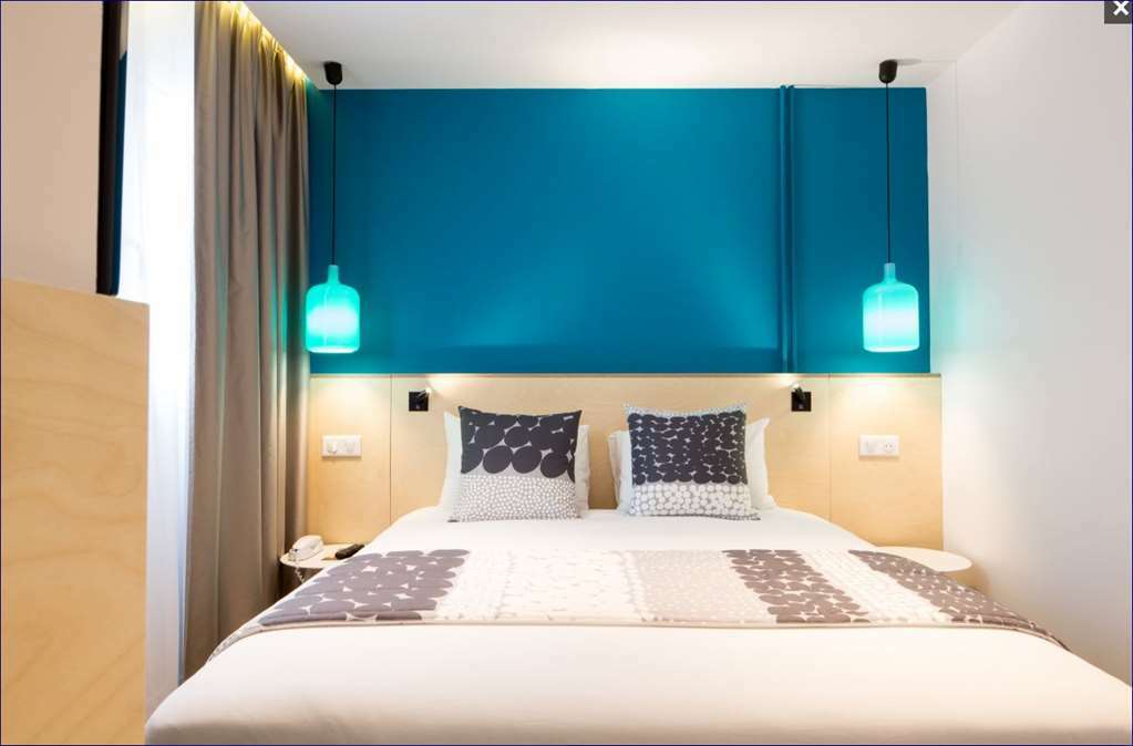 Hotel La Regence Courbevoie Zimmer foto